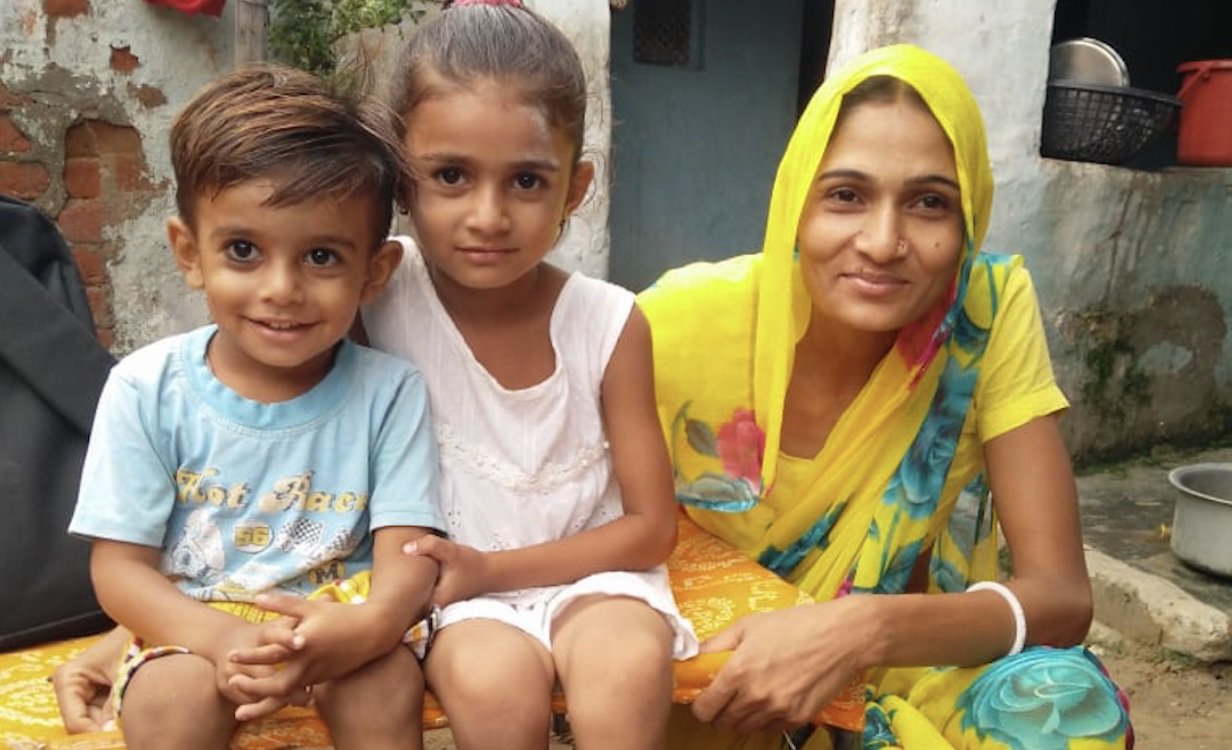 Pooja, a Fund A Mom recipient, with her kids