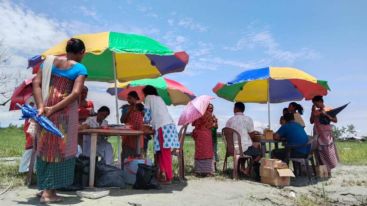 Women receiving information about the immunization program.