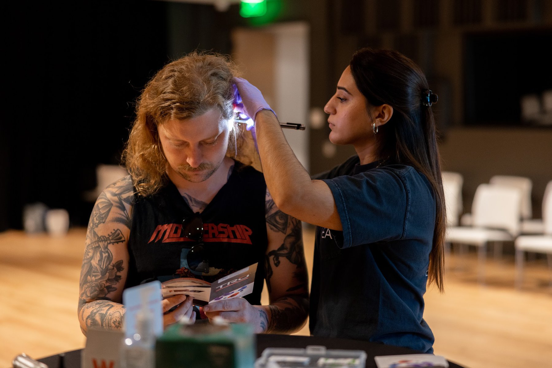 A musician getting his hearing checked.