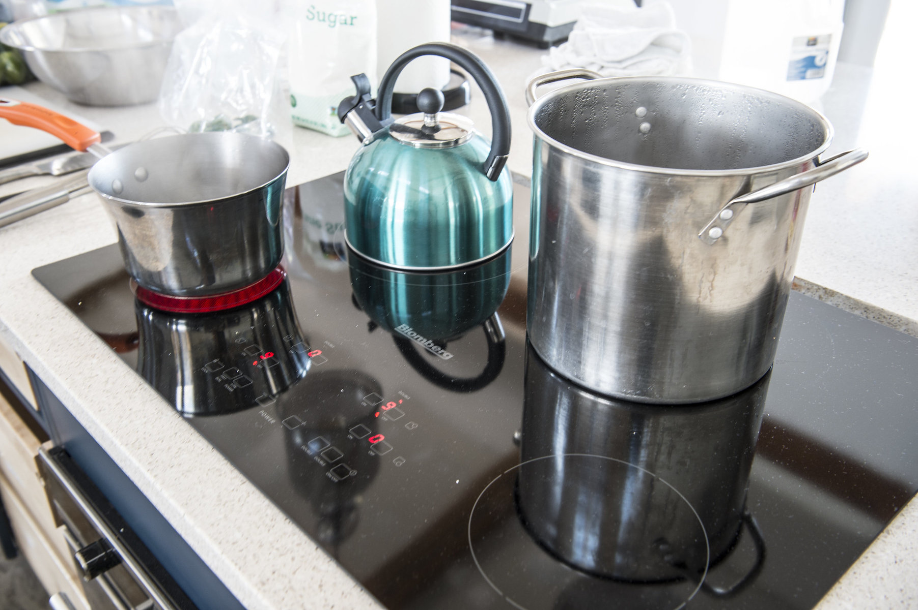 Pots on an induction stovetop.