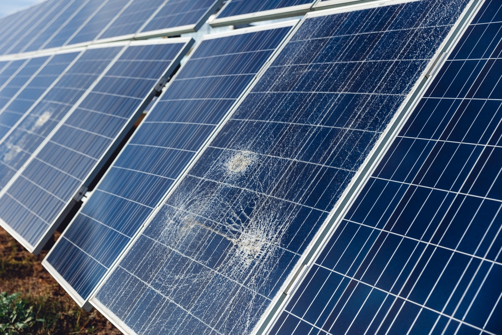 A solar panel damaged by hail.