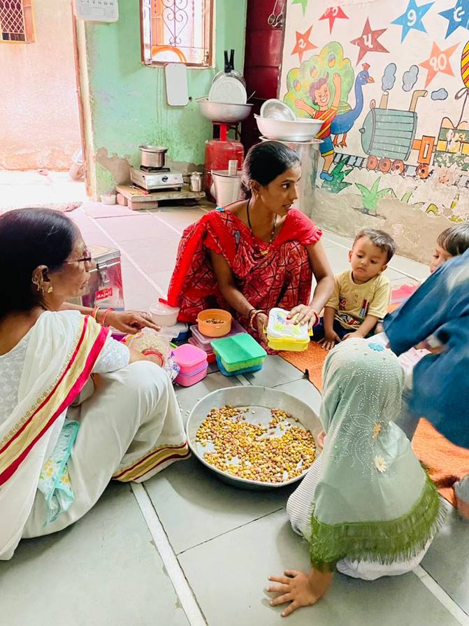 Children eat lunch at a Sangini childcare center.