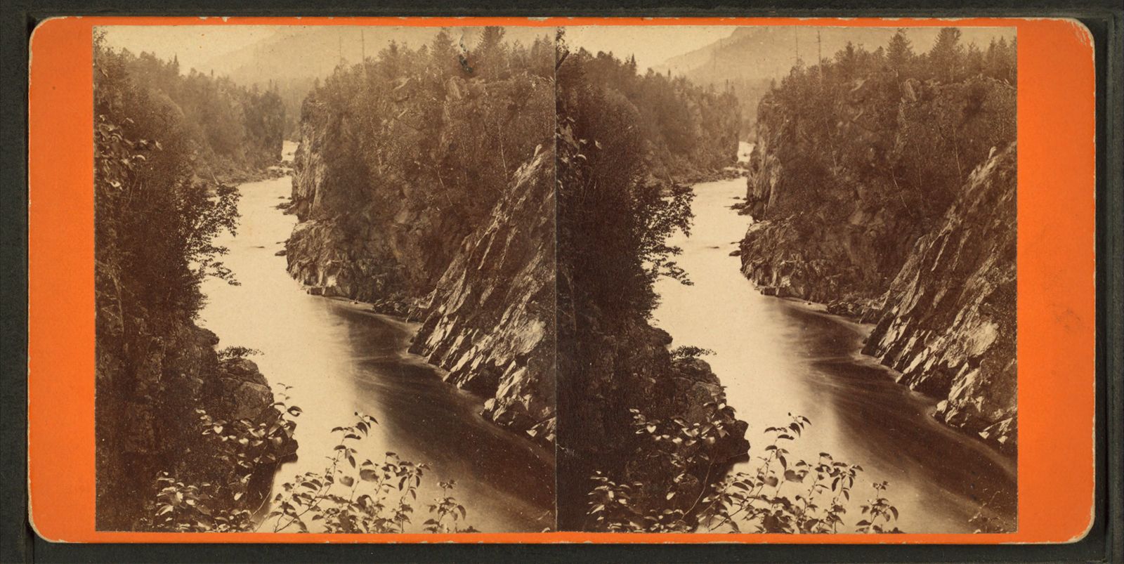 A stereograph from the 1870s shows the view from Ripogenus Falls on the Penobscot River.