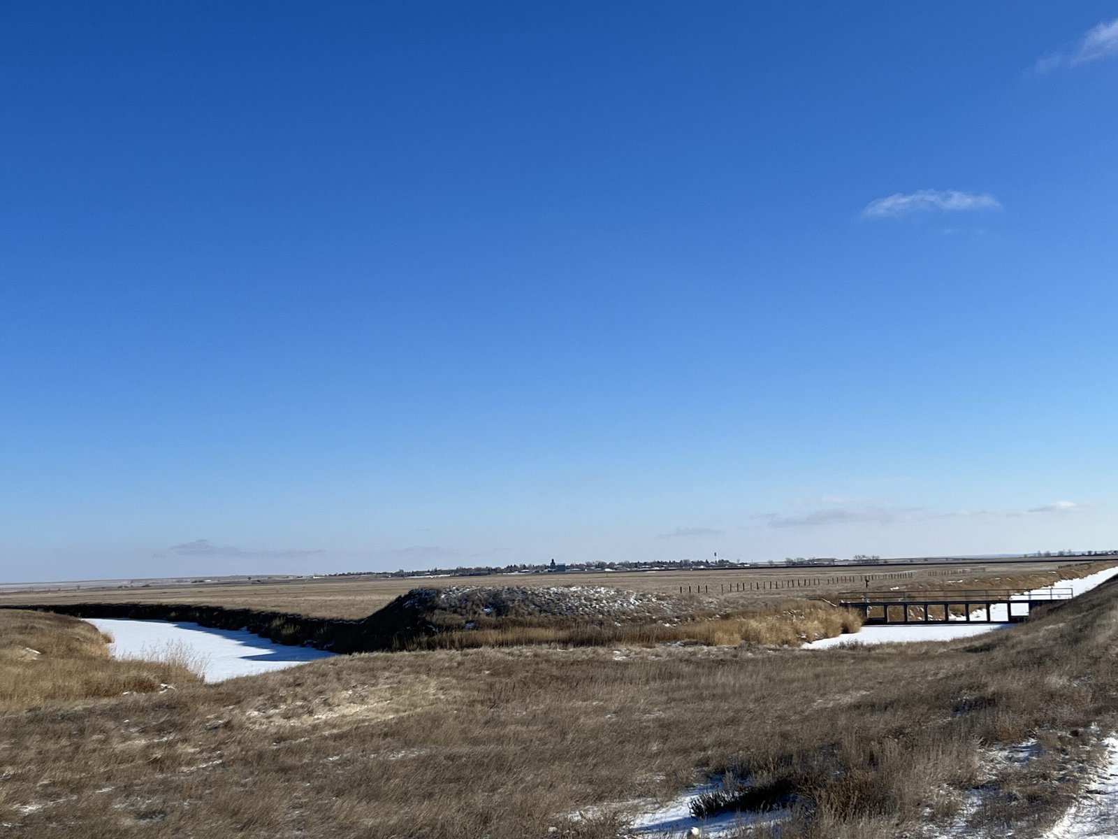 The Big Muddy Creek, on which the Fort Peck Tribes have a water right, flows through some dams and diversions, pictured on the right, that are managed by the Medicine Lake National Wildlife Refuge to fill the lake as needed.