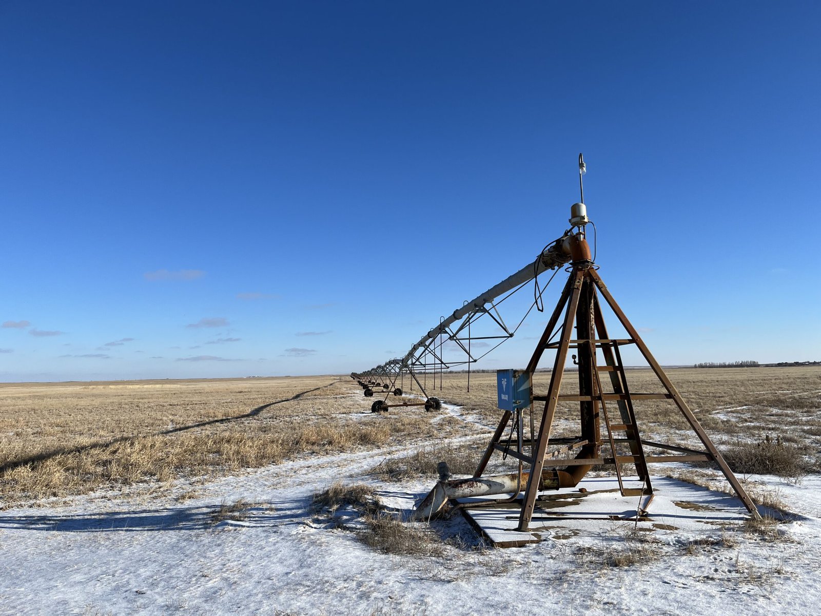 Rodney Smith's pivot is the largest connected to the aquifer. The structure in the foreground remains stationary, while the rest on wheels moves around — pivots around — the fixed structure.