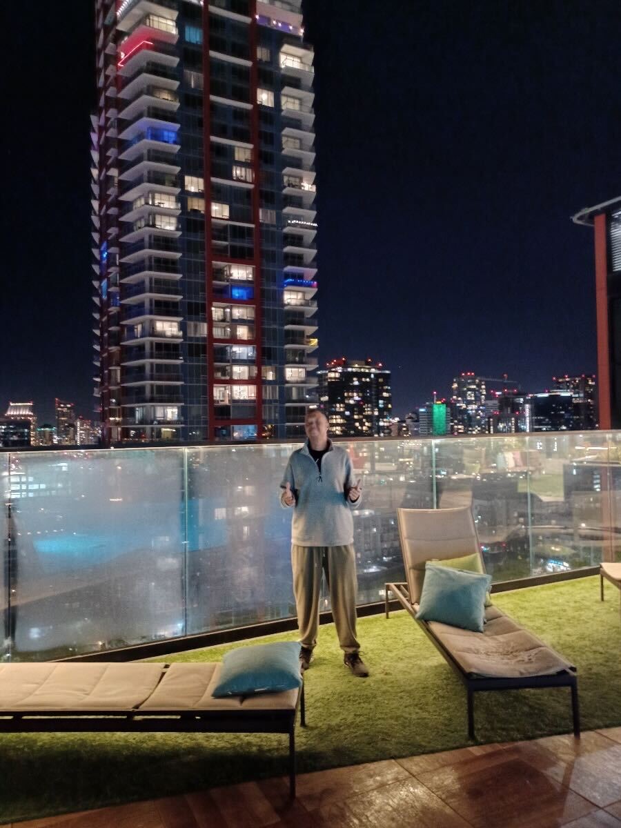 Brilliant Corners client Brian Wearren enjoys his apartment building's rooftop. 