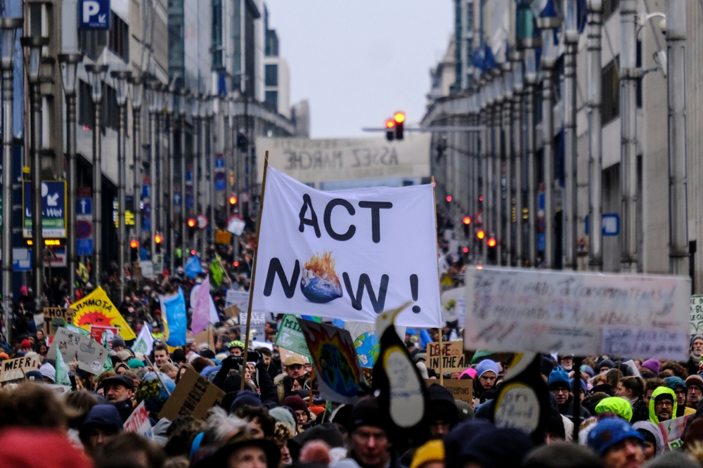 A climate protest in Brussels, Belgium during COP28 in Dubai last fall. 