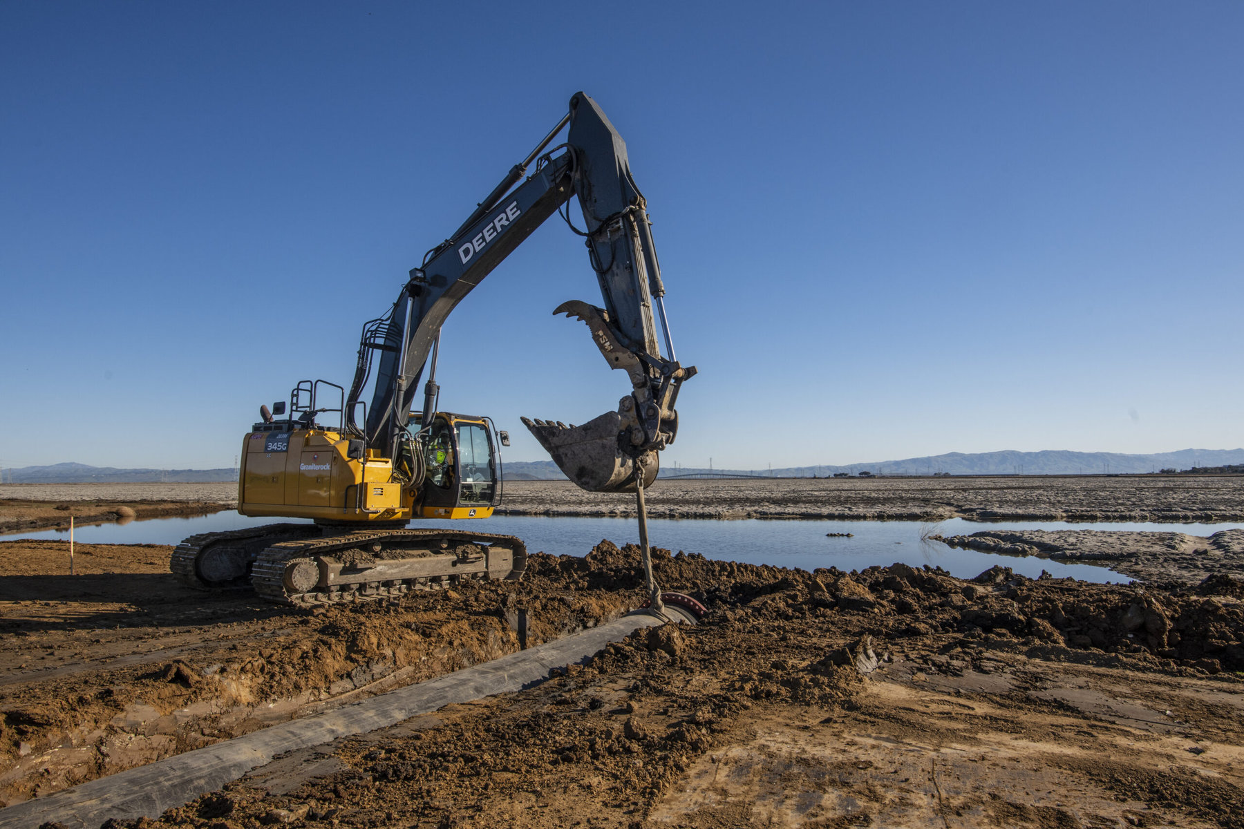 Construction to install water control structures in the managed ponds at the Ravenswood site.