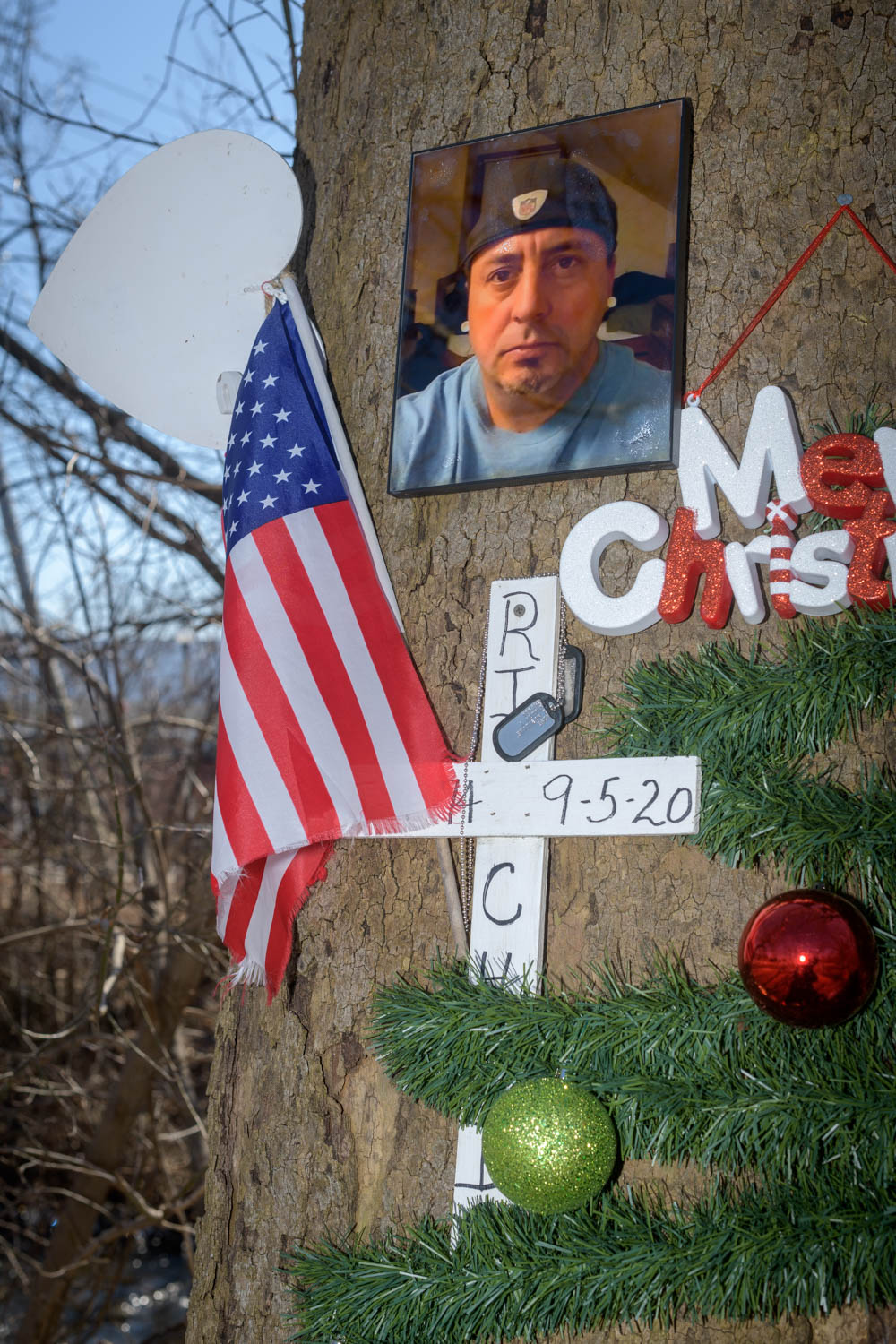 A memorial to Christopher Sharby, who died on the street in 2020, is on display in the so-called Peoples Park in Bennington, Vermont.