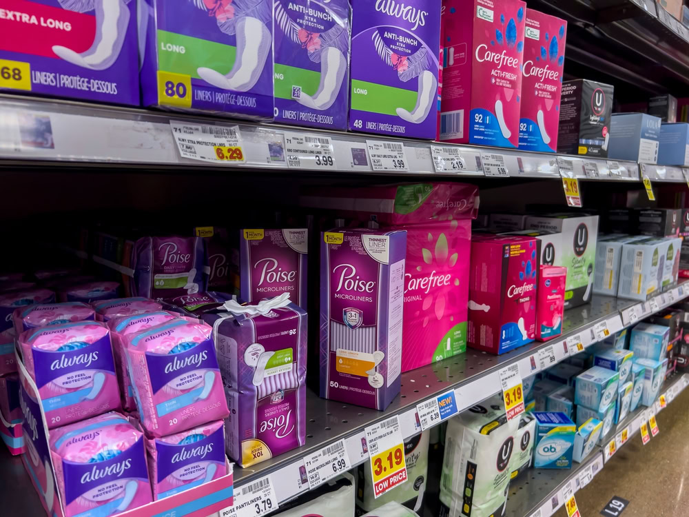 Pads and sanitary napkins for sale on shelves.