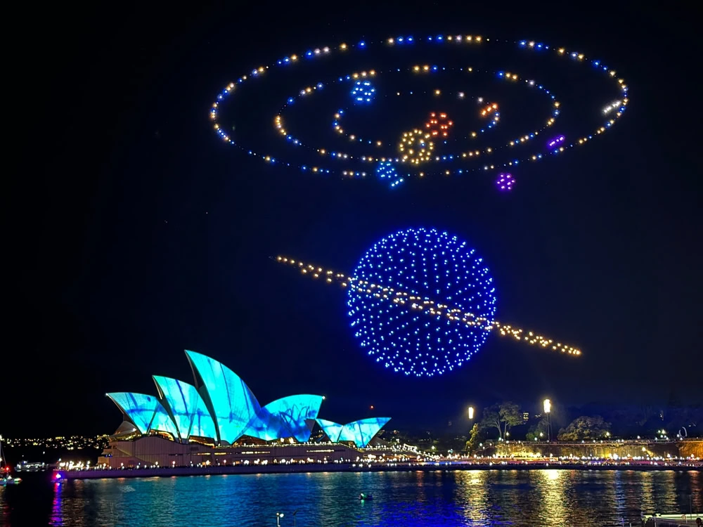 A drone show over Sydney, Australia including Saturn and the solar system.