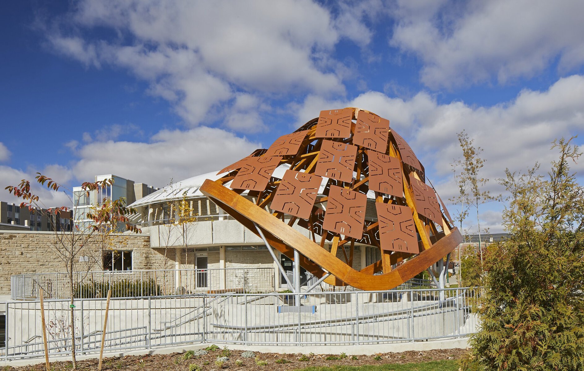 The Wampum Learning Lodge at Western University, with a structure that resembles a turtle in front.