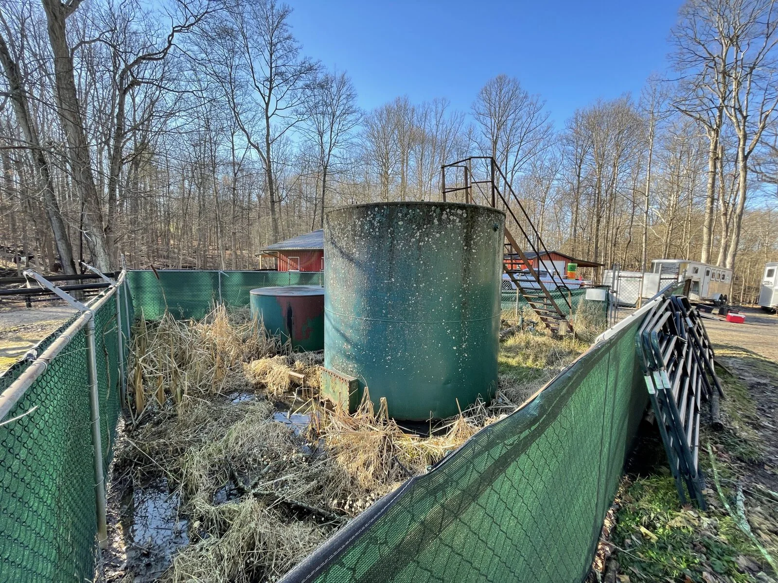 A tank at an abandoned oil well.