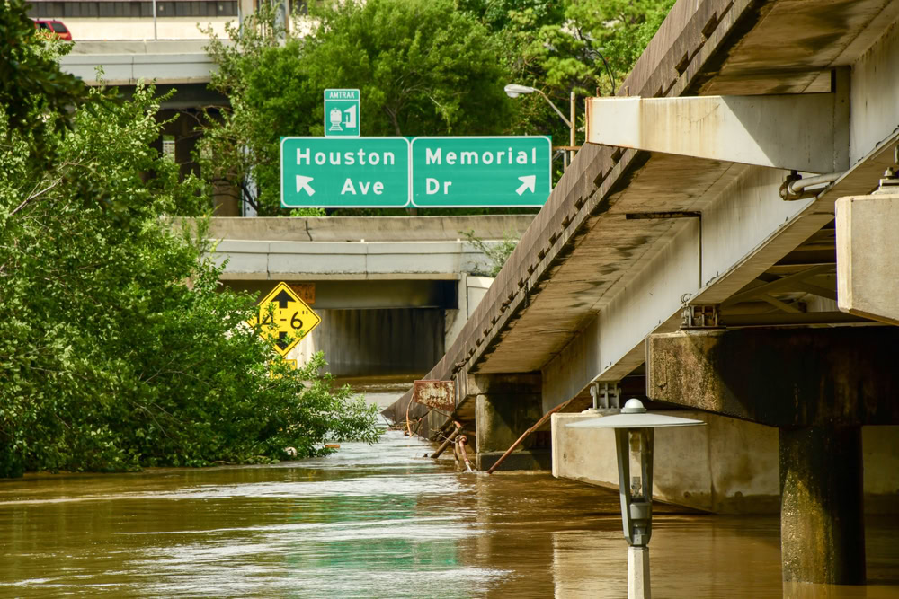 A flooded streetscape in Houston after Hurricane Beryl.