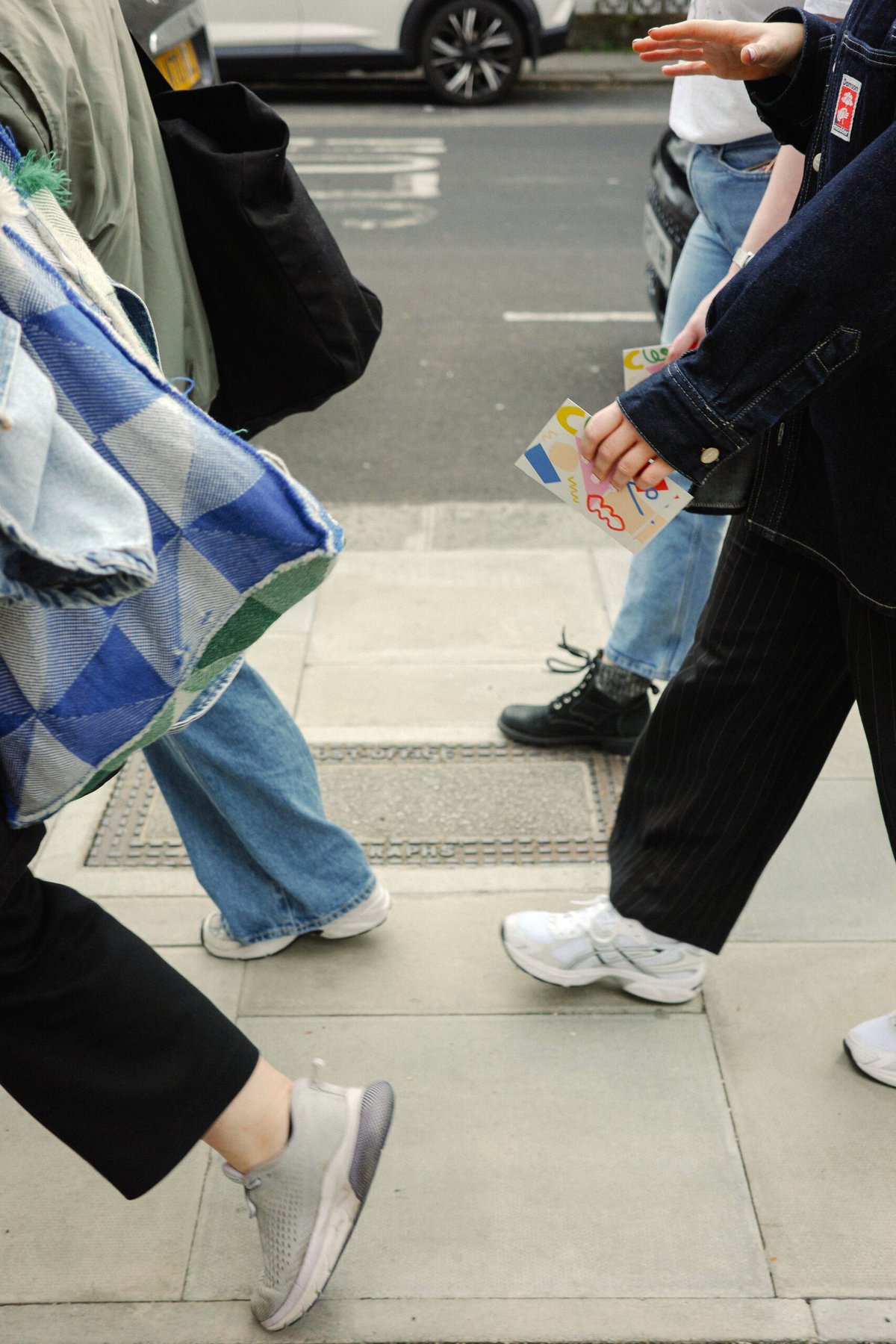 Legs in motion of people walking in London.