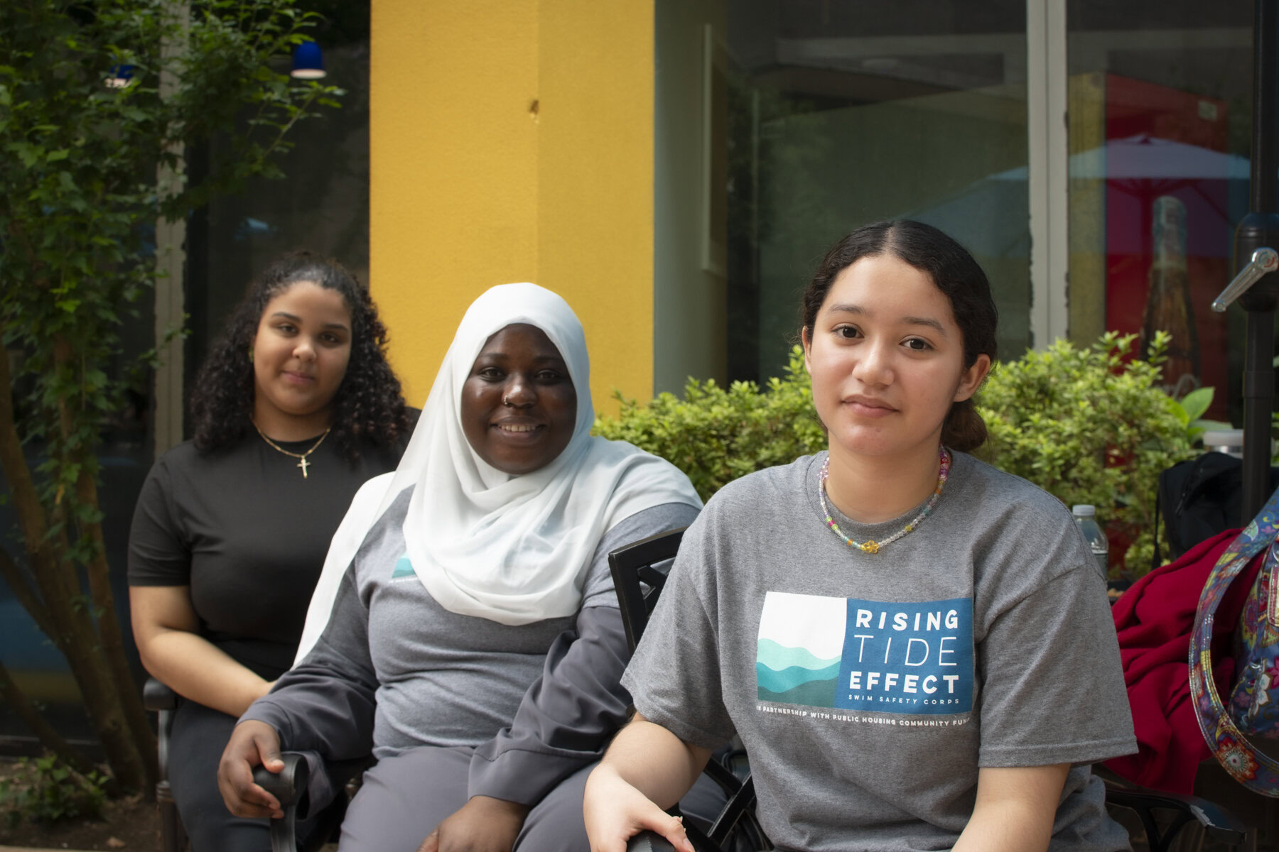 NYCHA Swim Corps participants Gismelgi Cuevas (left), Mariam Touray (center) and Diana Mileydi (right).