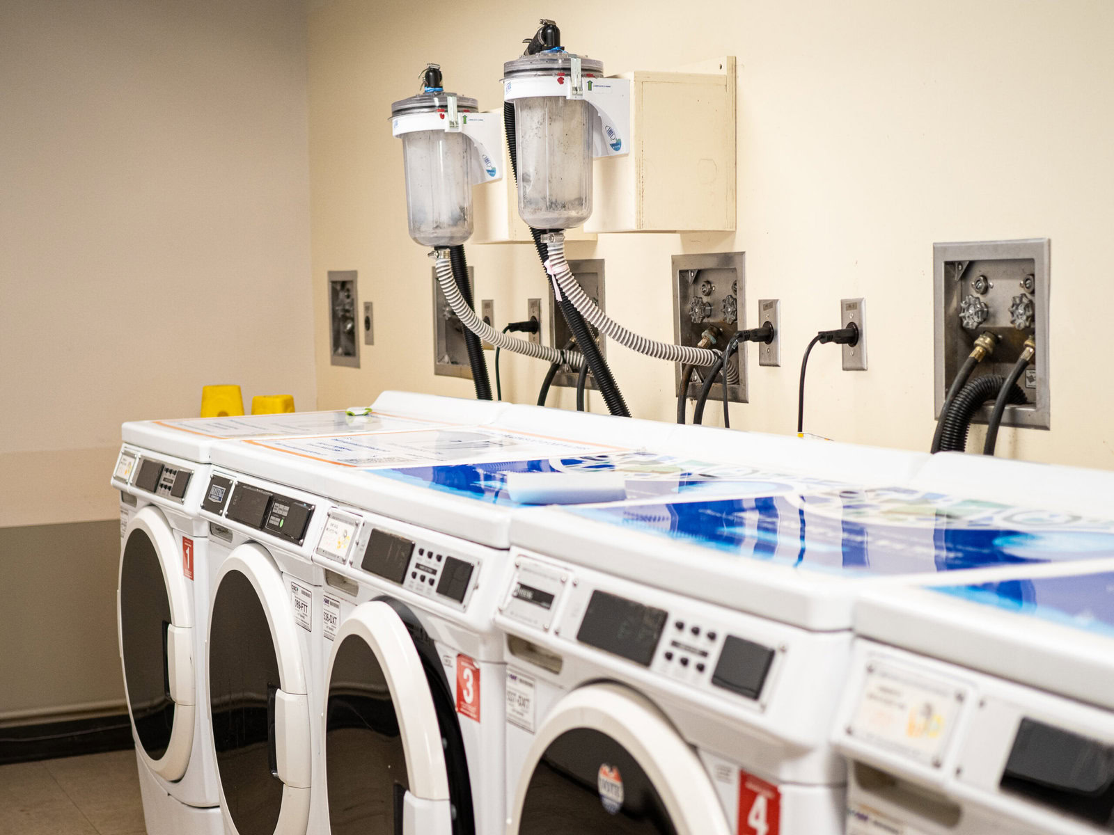 Washing machines with special filters to stop microfibers from polluting water in the Esopus Hall dorms.