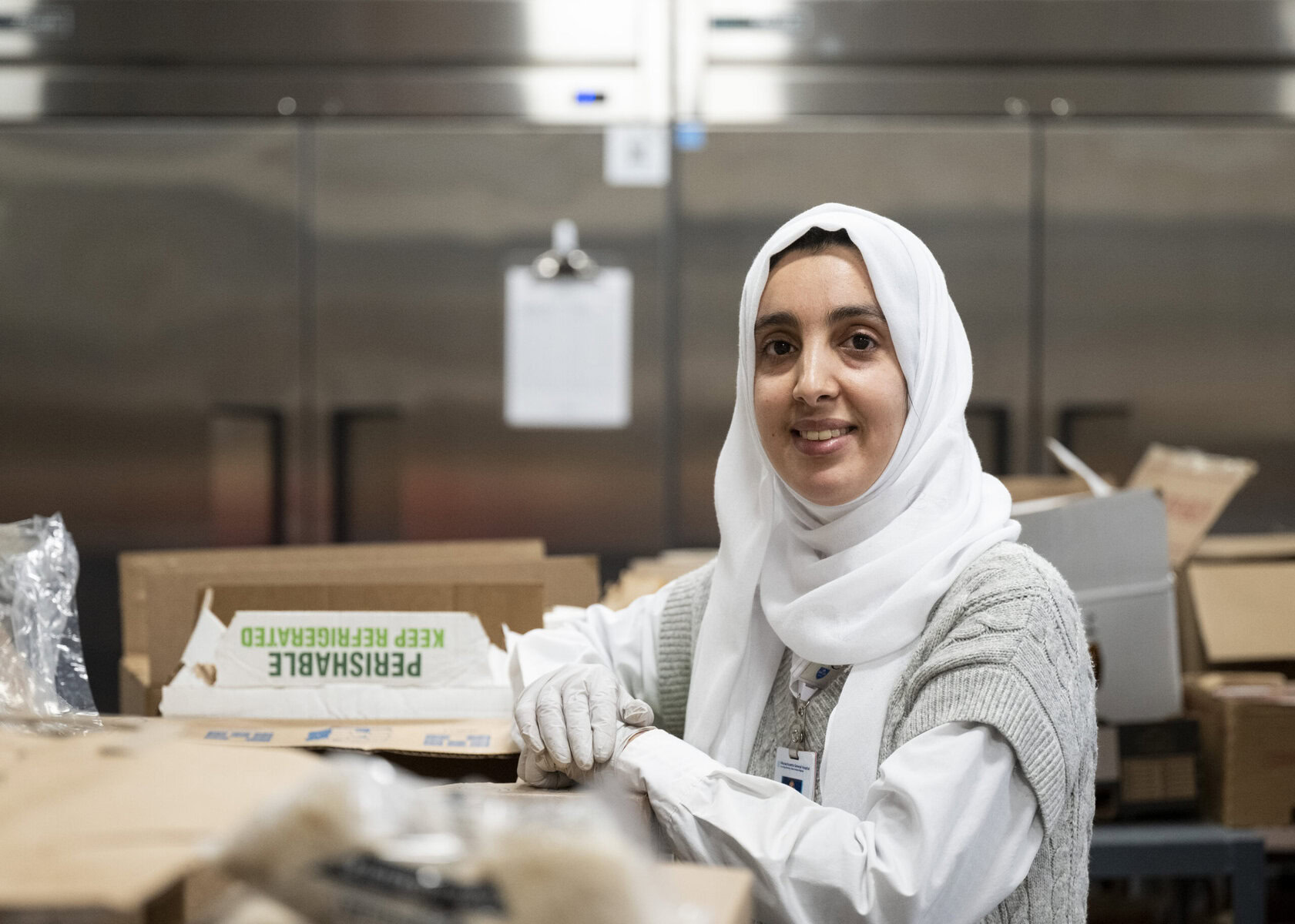 A worker at the plant-based pantry in Mass General Brigham in Revere.