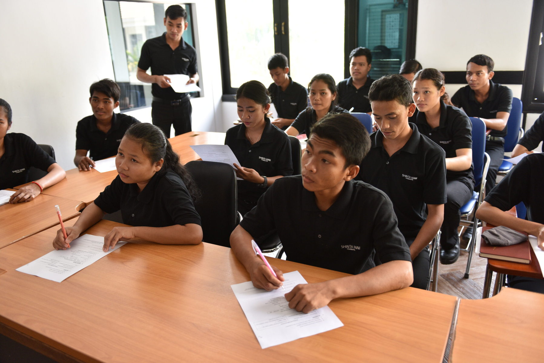 Hospitality school students in an English class. 