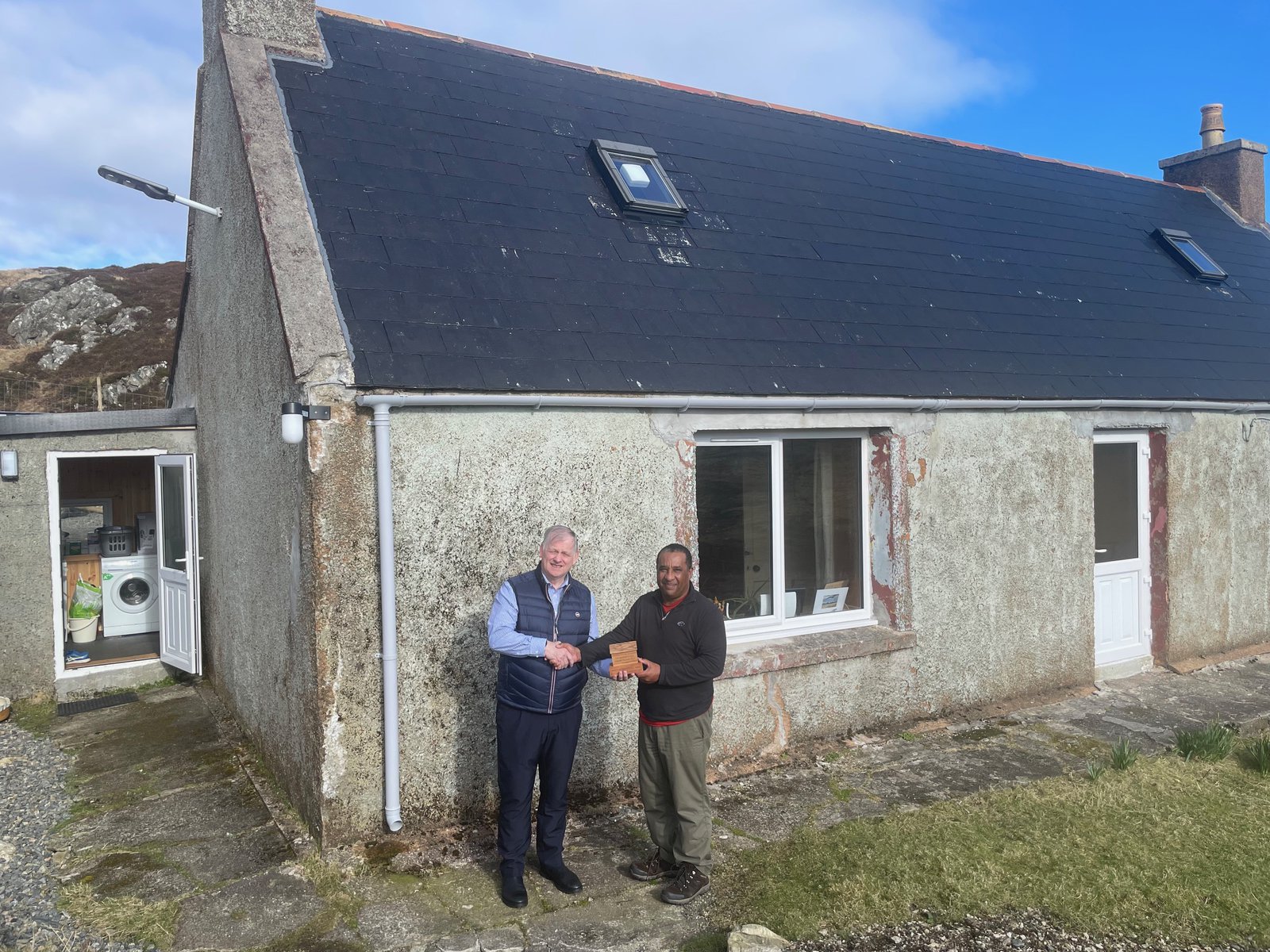 Robert Tai (left) with Murdo MacLeod from the Scottish Empty Homes Partnership.