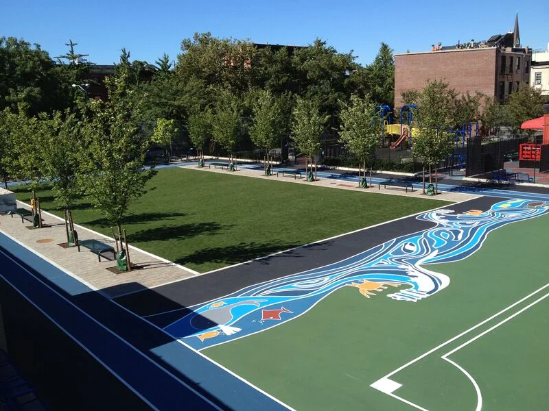 The vibrant P.S. 261 schoolyard after its transformation. 