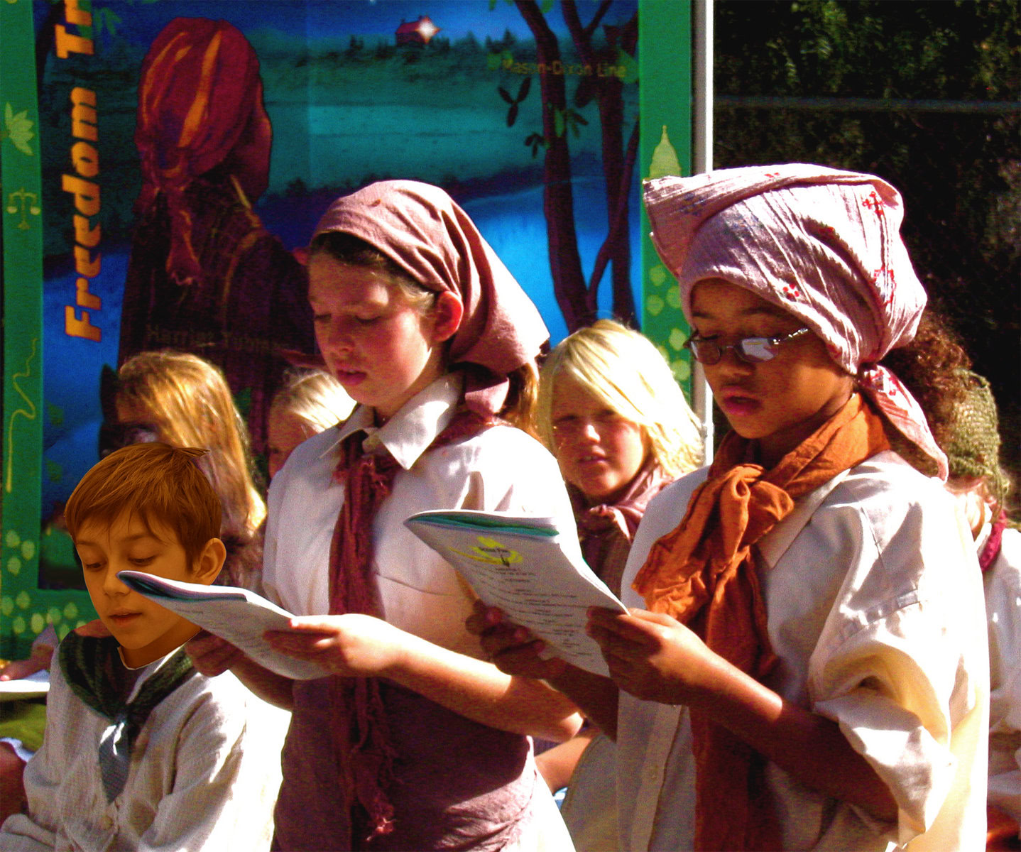 Students in costume read from scripts.