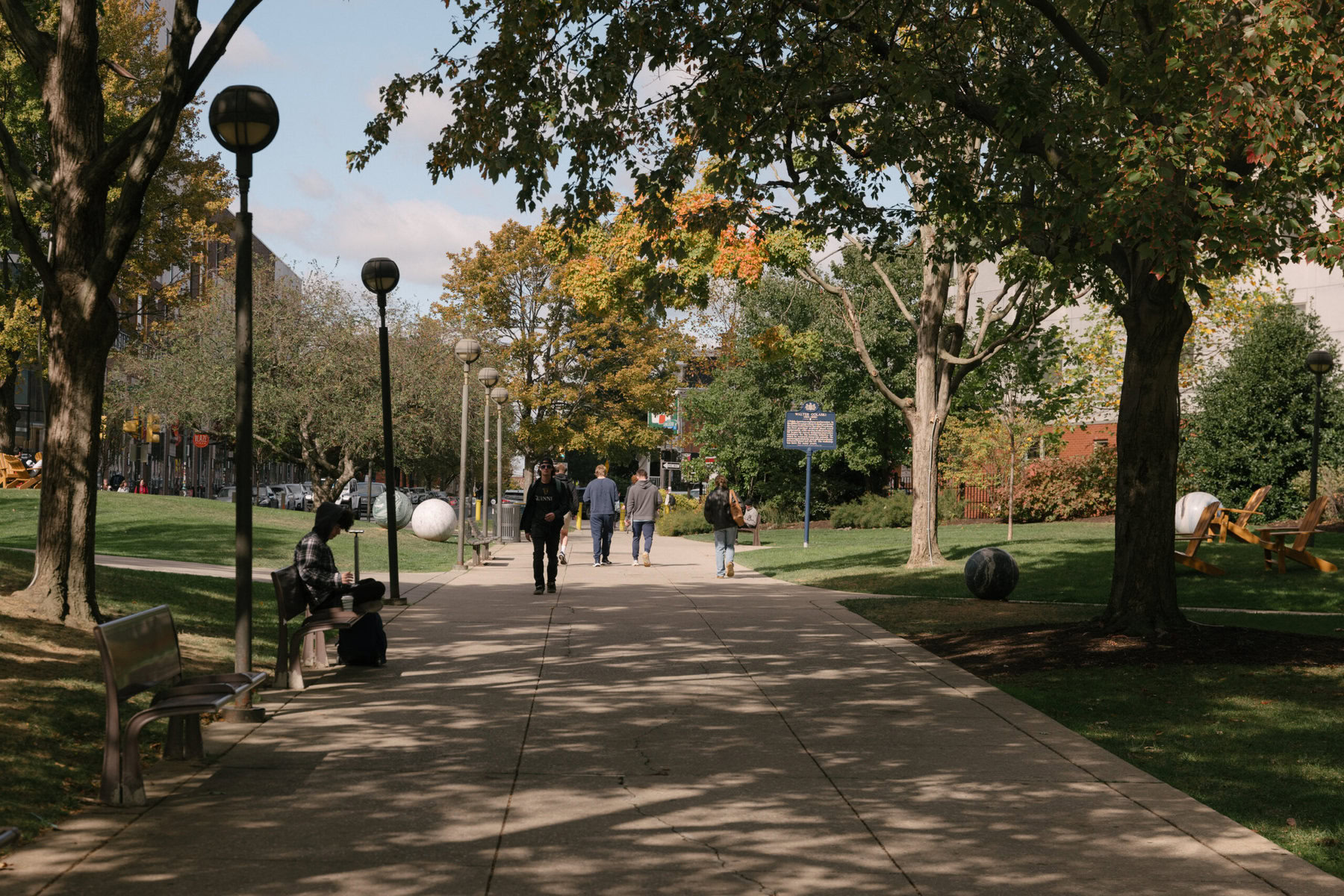 Students walk on campus at Drexel University, in Philadelphia, Pennsylvania, on October 16, 2024.