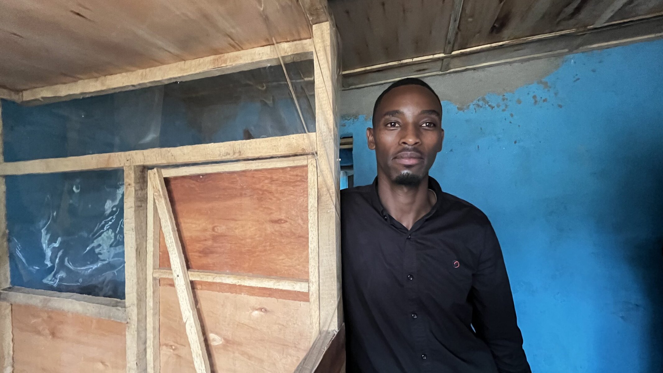 Vincent Ngamije, mushroom farmer from Rubavu, next to the zero input cool chamber he is building.