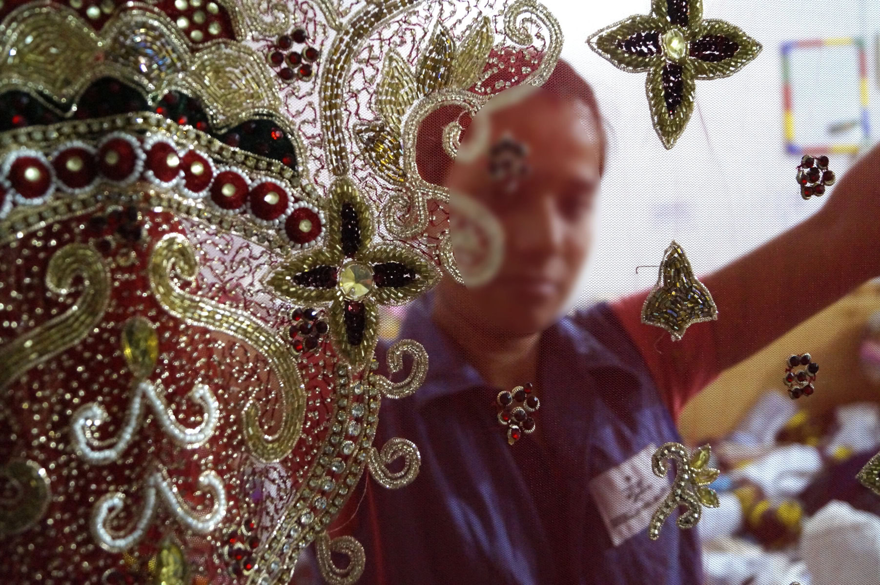 A bride-to-be admires a Goonj wedding dress.