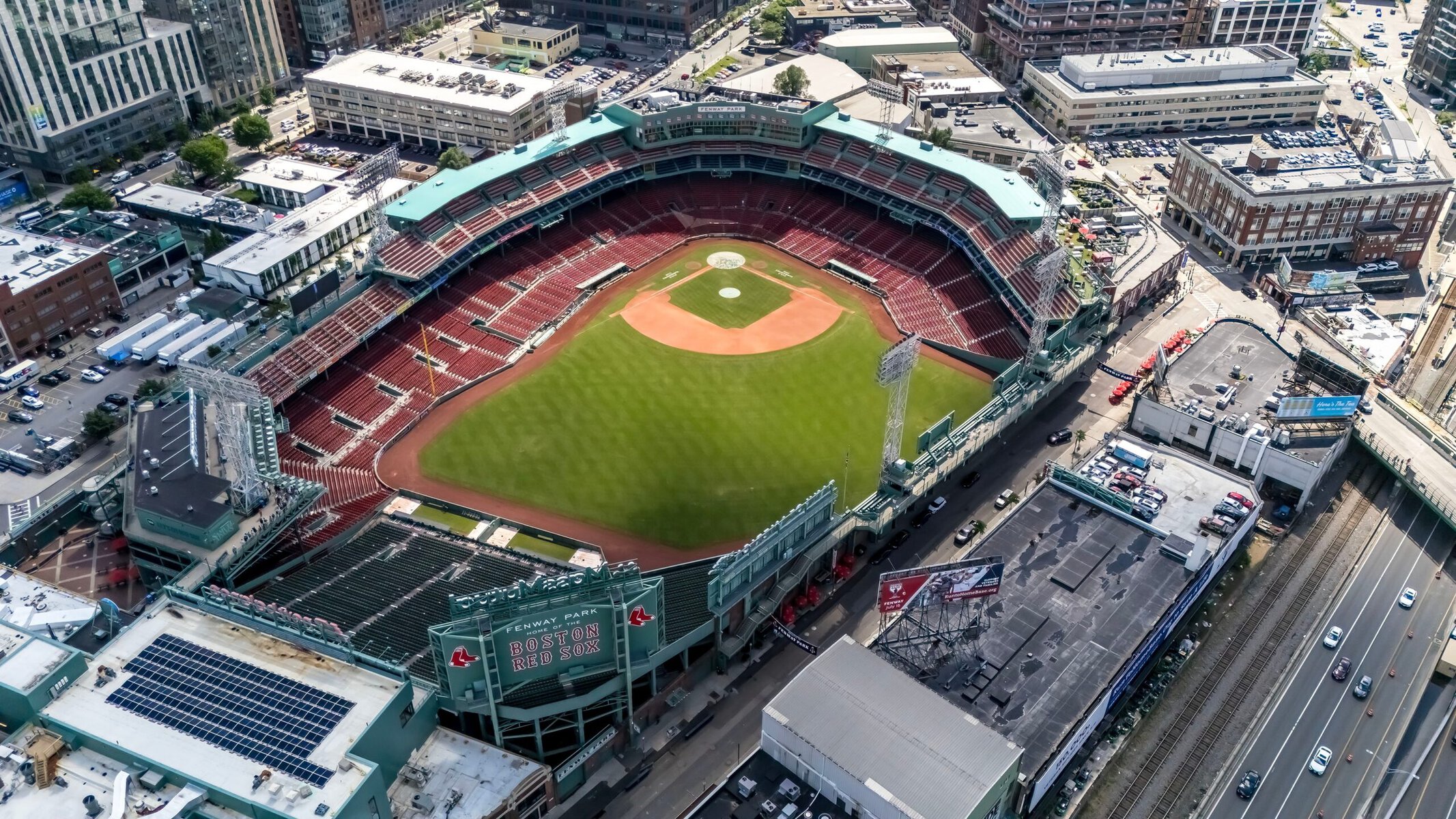 An aerial view of Fenway park and surrounding buildings.