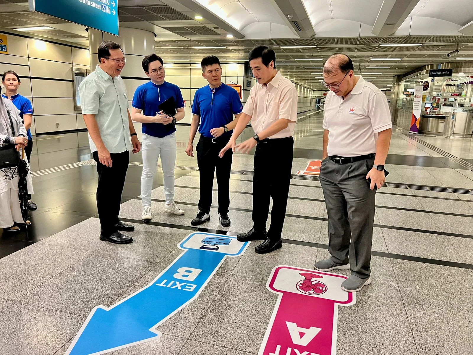 Clear signage on the floor helps people with dementia navigate a bus system.