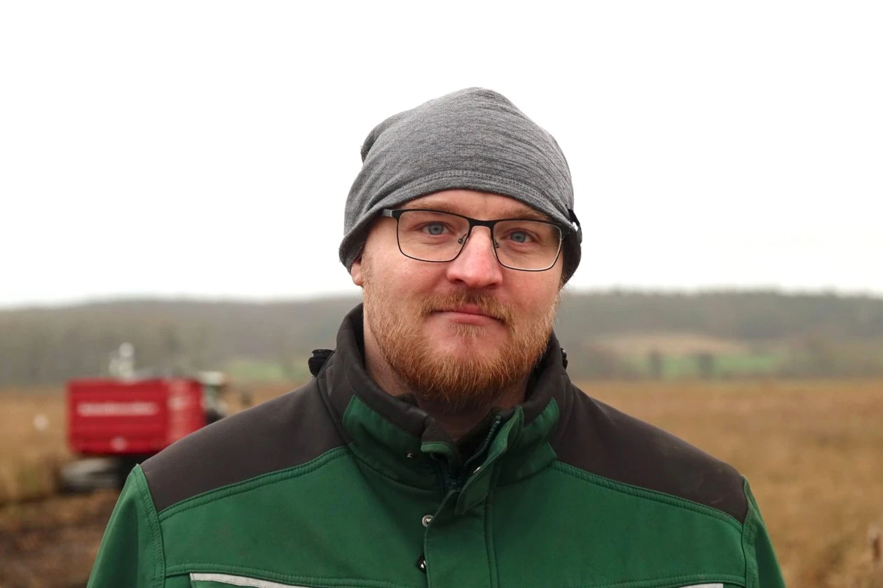 Henning Voigt poses in front of his rewetted peatland near Malchin, Germany.